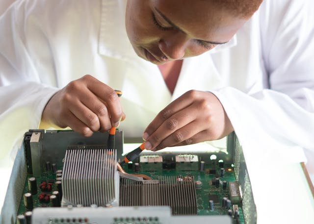 Student working in field.