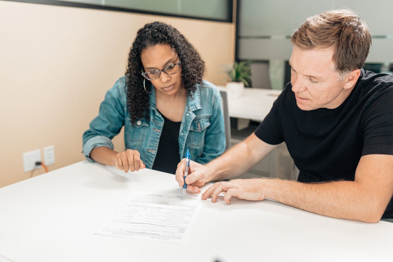 Student reviewing financial planning information. Photo by RDNE Stock project on Pexels.com.