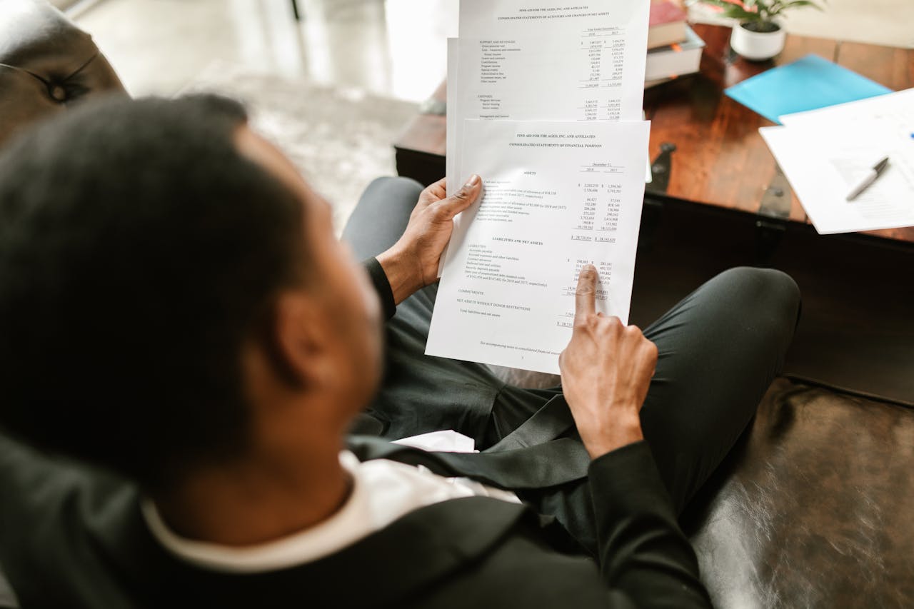 Student reviewing financial planning information. Photo by Kindel Media on Pexels.com.